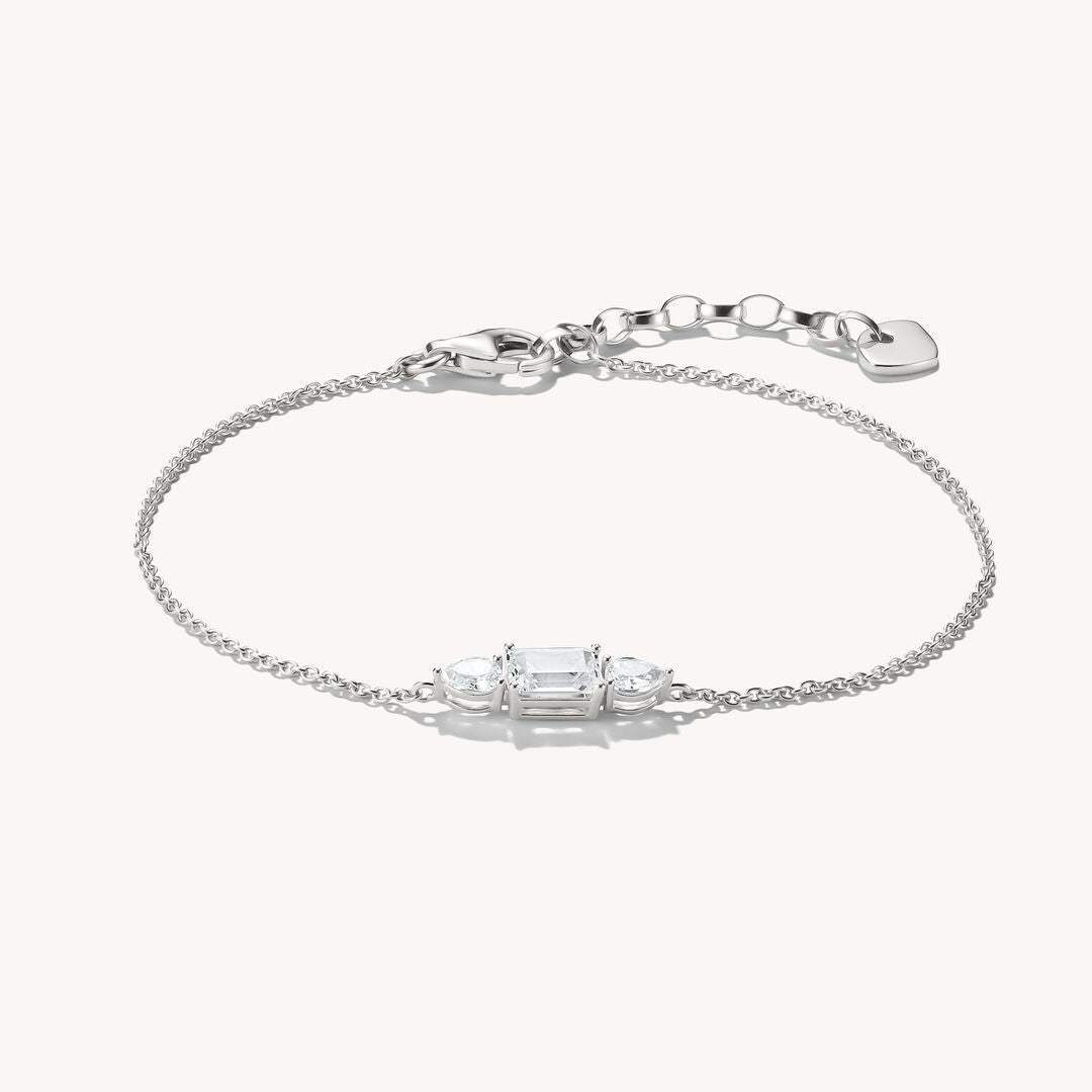 Silver bracelet with a small diamond on a white background