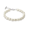 A baroque pearl bracelet with a silver toggle clasp, displayed on a clean white background.
