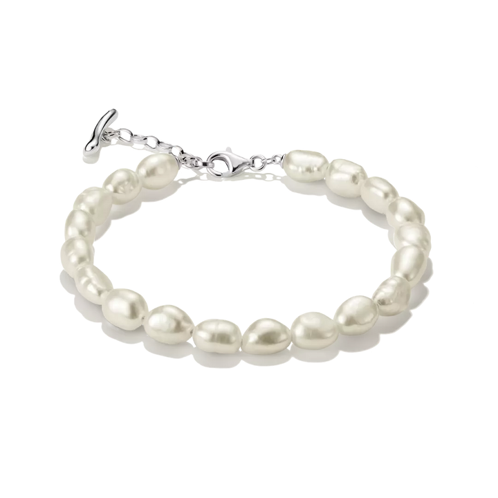 A baroque pearl bracelet with a silver toggle clasp, displayed on a clean white background.