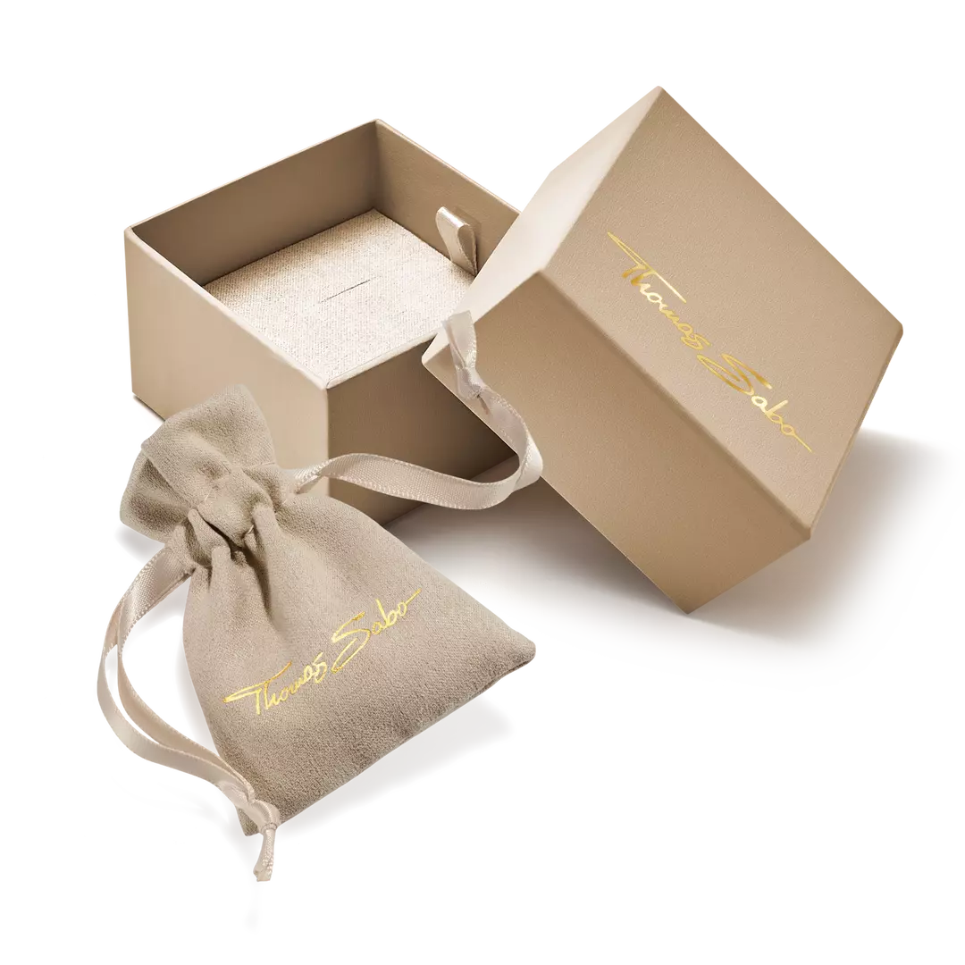 Open beige jewelry box with a drawstring bag featuring 'Tiffany & Co.' branding on a white background.