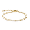A delicate double-strand gold chain bracelet with small bead accents, a lobster clasp, and an adjustable extender chain with a round tag, shown on a plain white background.