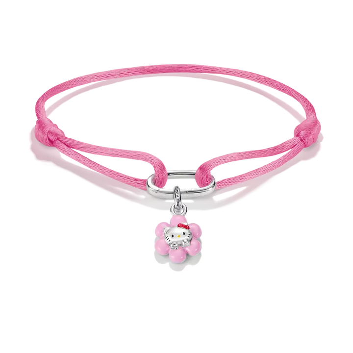 A pink braided cord bracelet featuring a silver-toned metal clasp and a Hello Kitty flower charm, displayed on a clean white background.