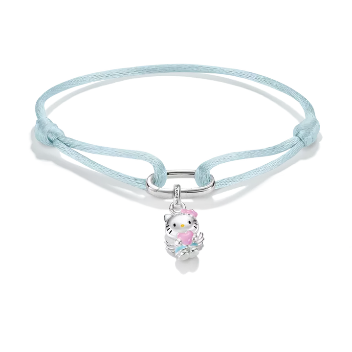 A light blue braided cord bracelet with a silver-toned metal ring and a small Hello Kitty charm featuring pink, white, and blue details, shown on a clean white background.