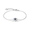 A silver chain bracelet with a central star-shaped charm featuring a dark blue oval center and small light blue stones, shown on a clean white background.
