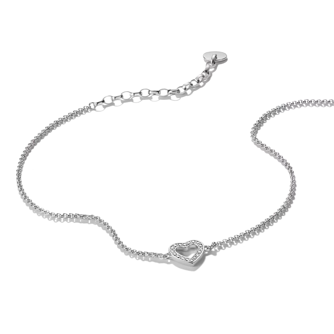 A delicate silver chain bracelet with a small heart-shaped pavé center and an adjustable lobster clasp, shown on a plain white background.