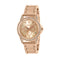 Rose gold watch with gemstone accents on a white background
