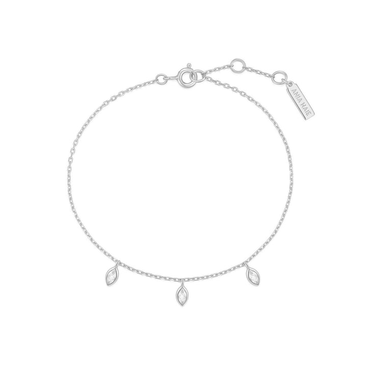 Silver bracelet with three teardrop-shaped charms on a white background
