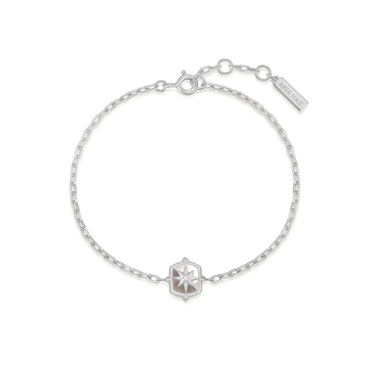 Silver bracelet with a star-shaped clasp on a white background