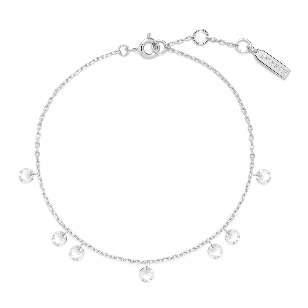 Silver bracelet with crystal charms on a white background
