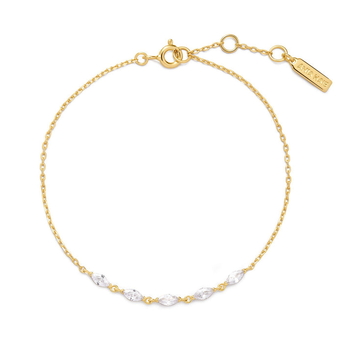 Gold and silver bracelet on a white background