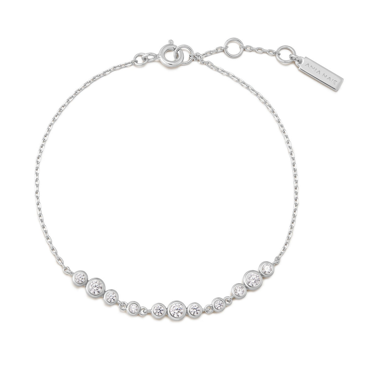 Silver bracelet with clear stones on a white background
