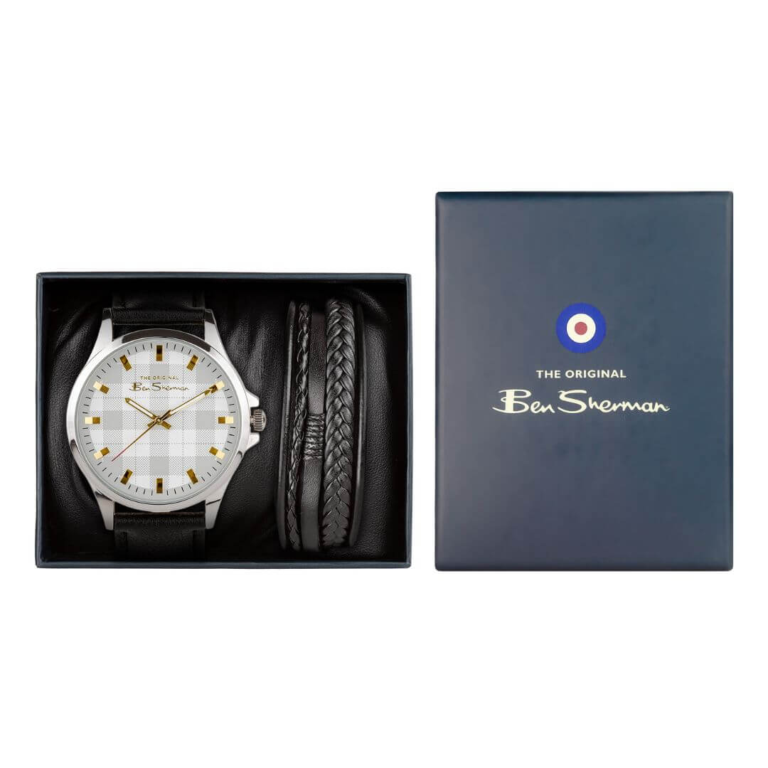 Watch with a black strap and a white face featuring gold accents, on a white background.