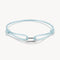 Light blue braided bracelet with a silver clasp on a white background