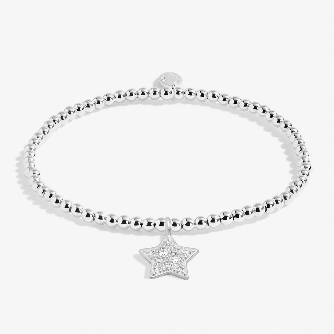 a beaded bracelet with a star charm