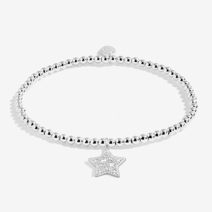 a beaded bracelet with a star charm