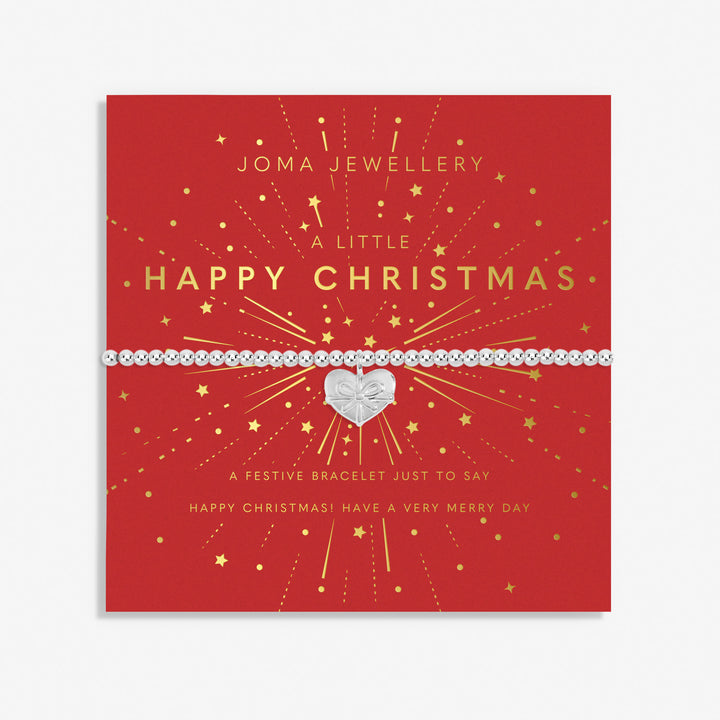 a red christmas card with a heart on it