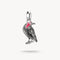 Silver bird-shaped pendant with red accents on a white background