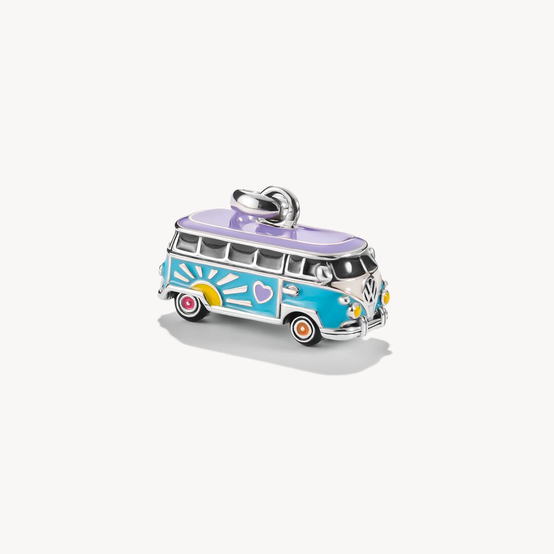 VW van charm with a flower design on a white background