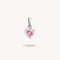 Heart-shaped pendant with a pink gemstone on a white background