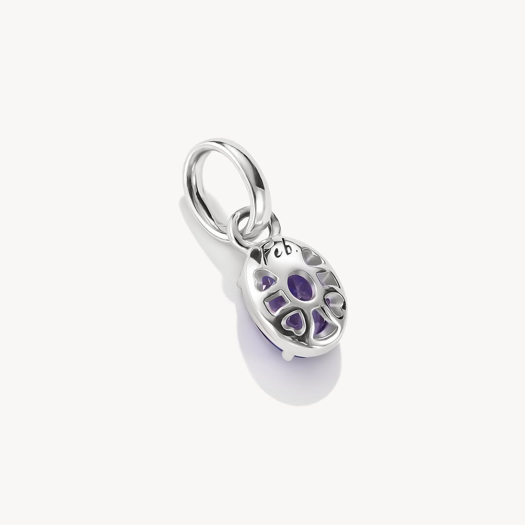 Silver pendant with purple gemstone on a white background