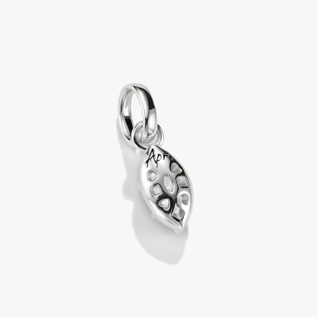 Silver pendant with a clear gemstone on a white background