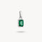 Silver pendant with a green gemstone on a white background