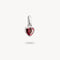 Heart-shaped pendant with a red gemstone on a white background
