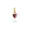 A gold heart-shaped pendant charm featuring a faceted dark pinkish-red gemstone, shown against a solid white background with a soft shadow underneath.