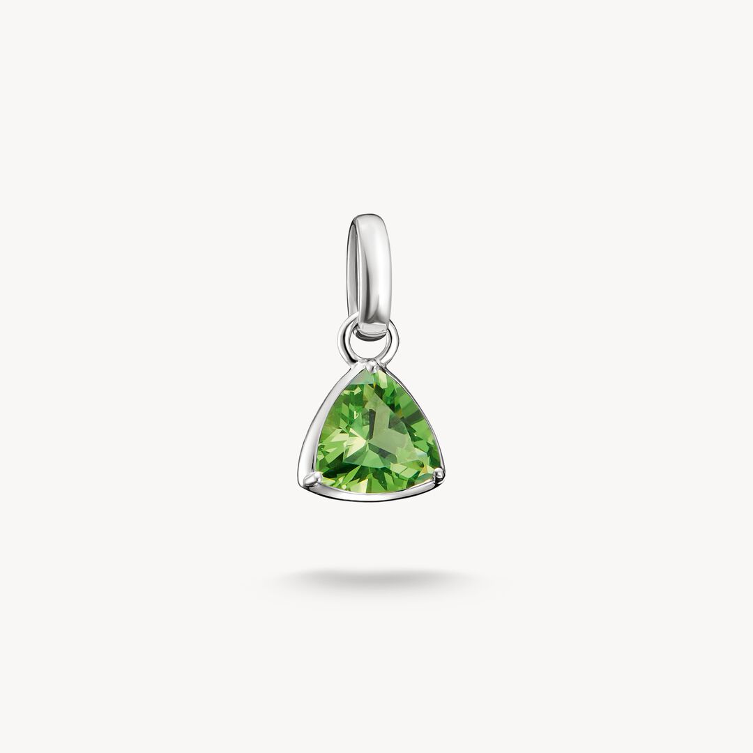 Green gemstone pendant on a white background