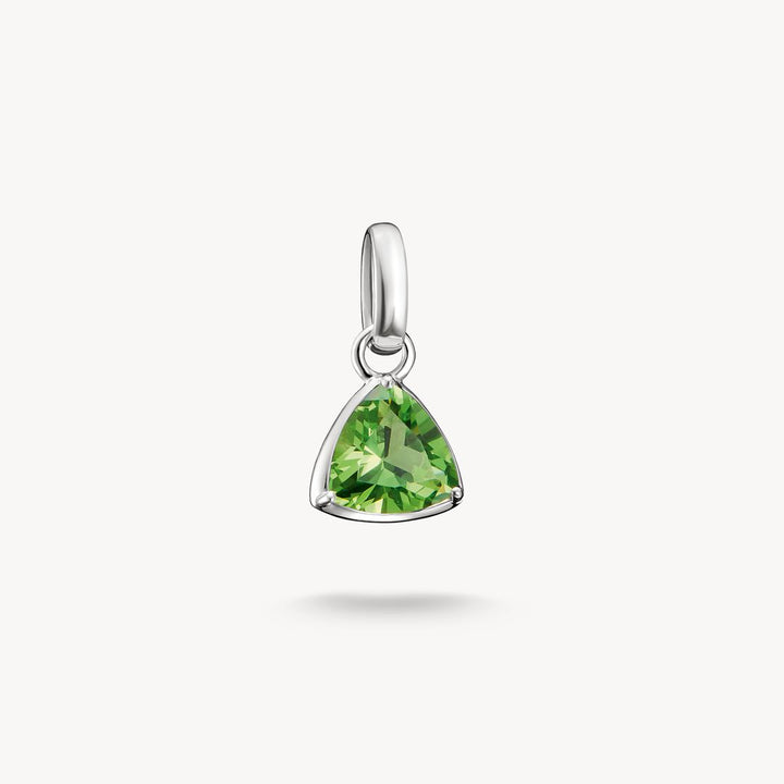 Green gemstone pendant on a white background