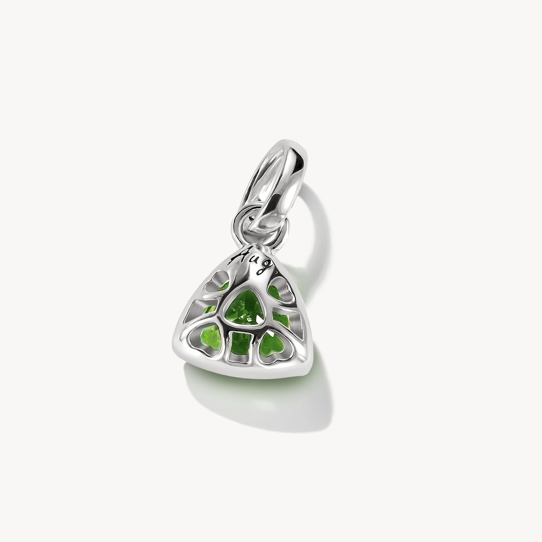 Green gemstone pendant on a white background