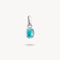 Silver pendant with a turquoise stone on a white background
