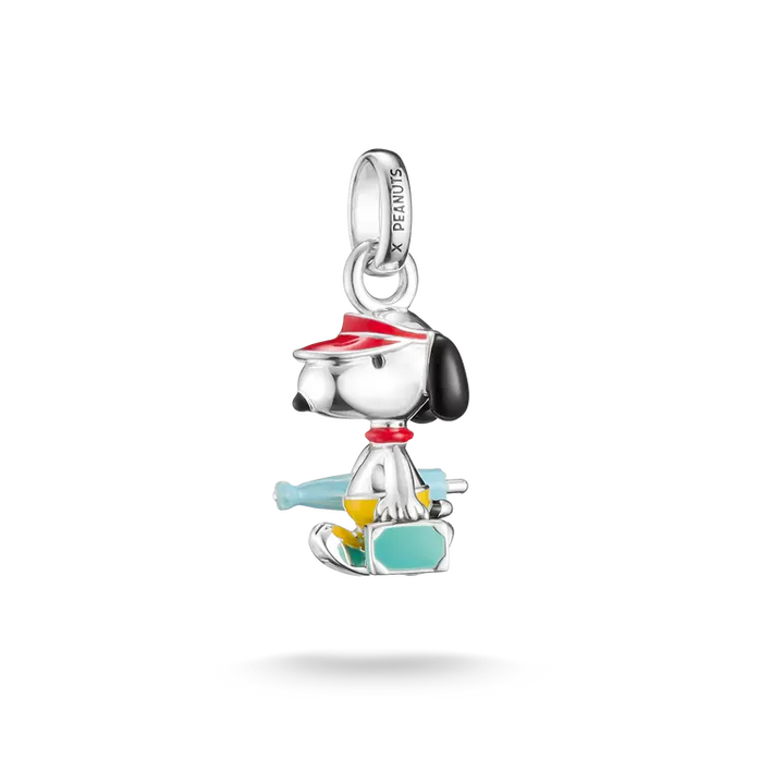 Pendant shaped like a dog with a colorful design on a white background