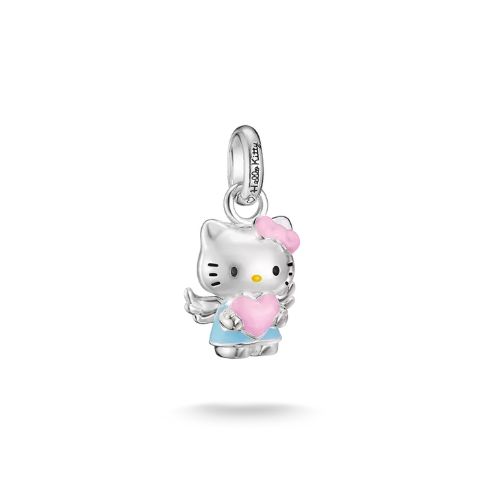 A silver Hello Kitty angel charm holding a pink heart, featuring a silver body, pink bow and heart, and a light blue skirt, shown on a white background.