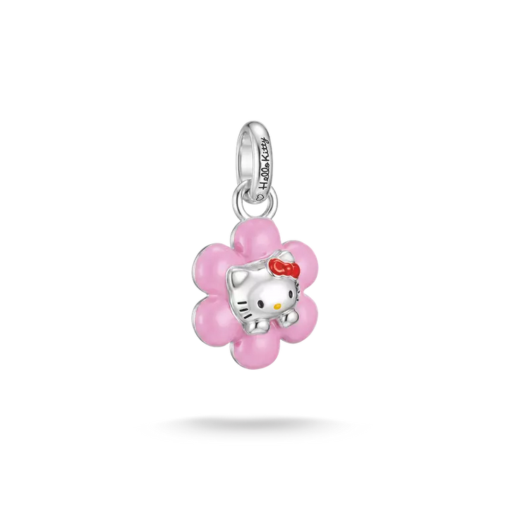 A silver Hello Kitty flower charm pendant with pink enamel petals and a small red bow, shown on a clean white background.