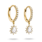 A pair of gold huggie hoop earrings with small clear stones along the front and a dangling starburst cluster featuring a large oval clear center stone surrounded by smaller clear stones, shown on a white background.