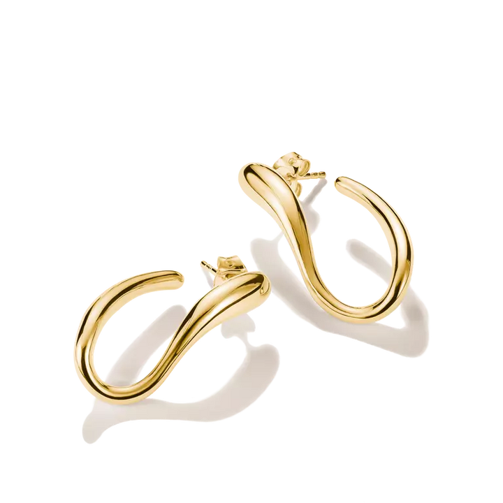 A pair of polished gold hoop earrings with a unique, wavy, open-loop design, displayed on a clean white background with soft shadows.