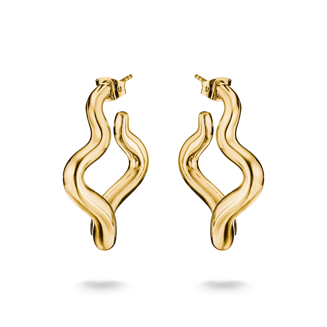 A pair of gold huggie hoop earrings with a wavy, flowing abstract design, shown on a clean white background with soft shadows below.