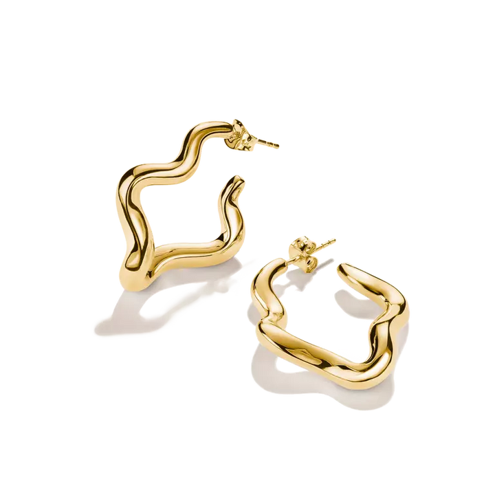 A pair of gold-toned, wavy open hoop earrings with a polished finish, displayed on a clean white background with soft shadows.