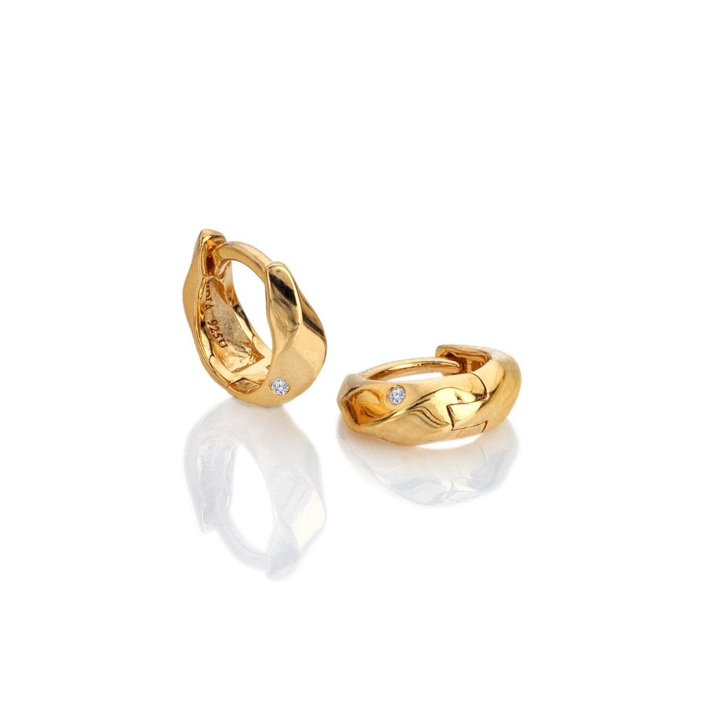 Two gold hoop earrings with small diamonds 