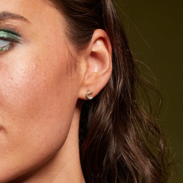 Close-up of a woman's ear with an earring 