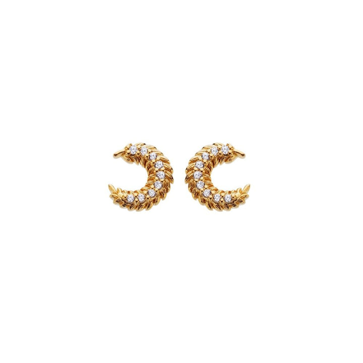 Gold crescent moon earrings with embedded stones 
