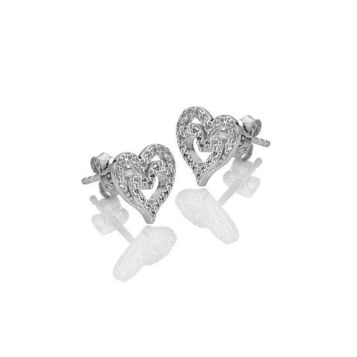 Heart-shaped silver earrings with clear stones 