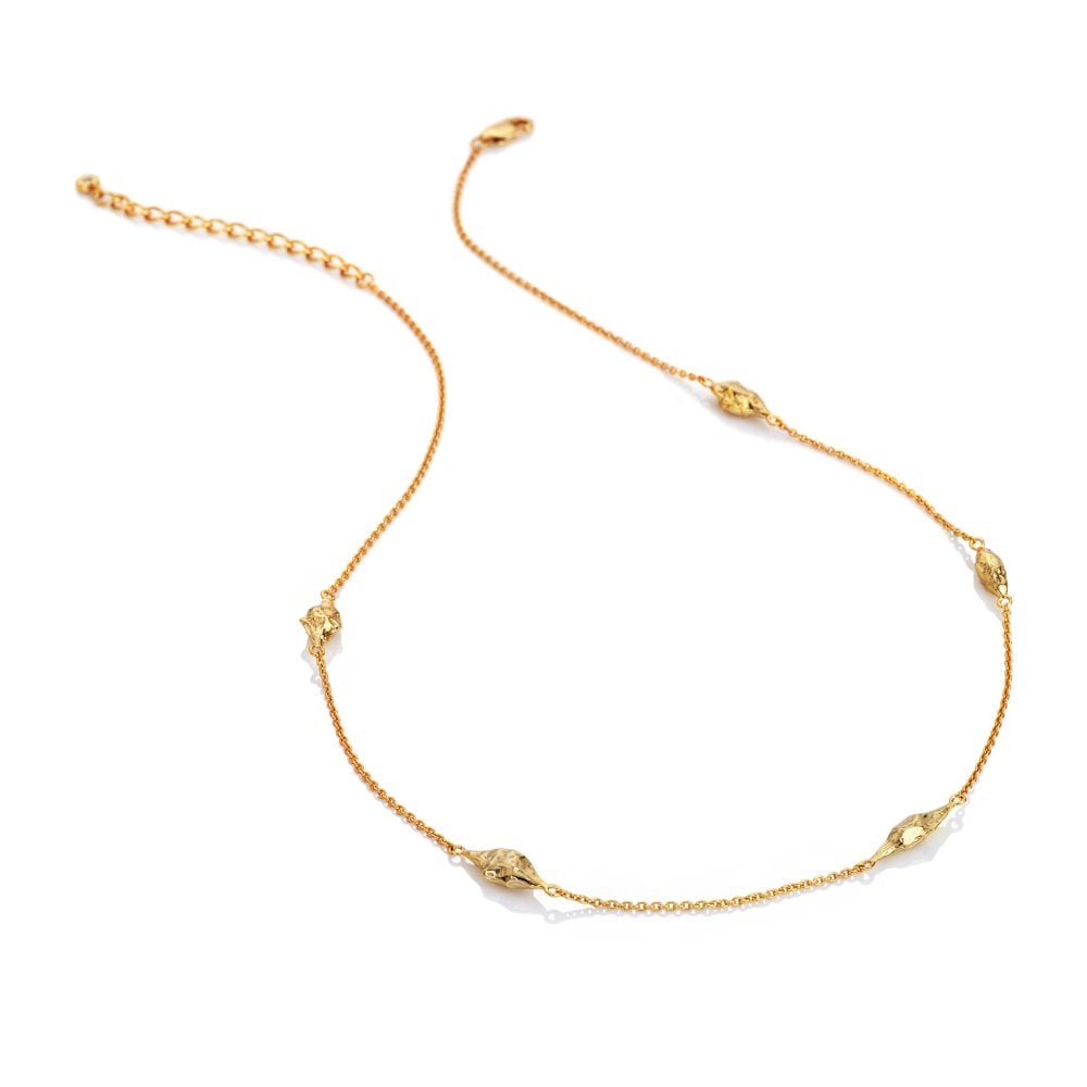Gold necklace with small decorative elements 