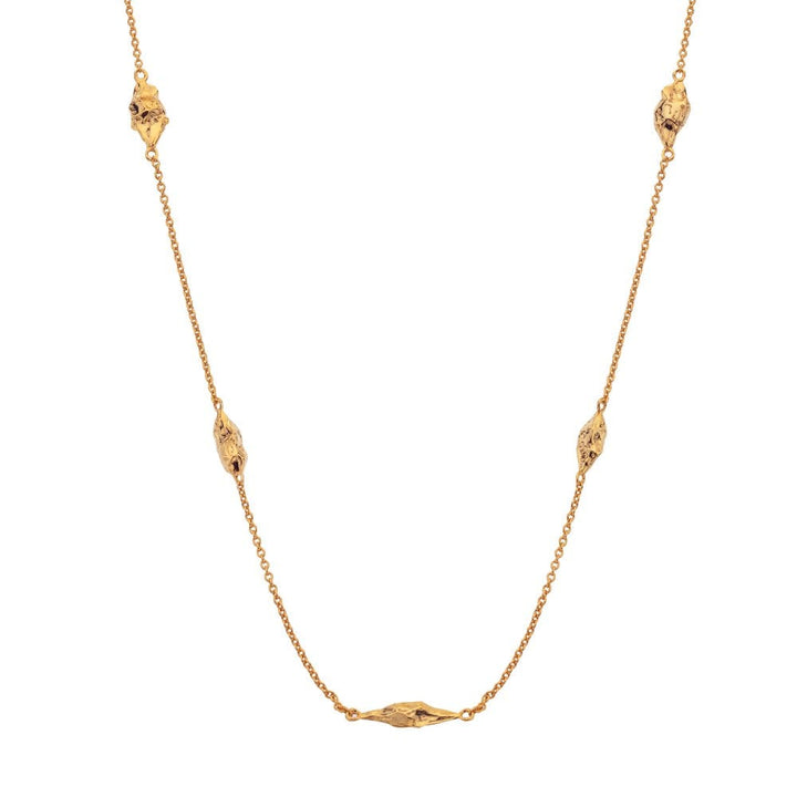 Gold necklace with small decorative elements 