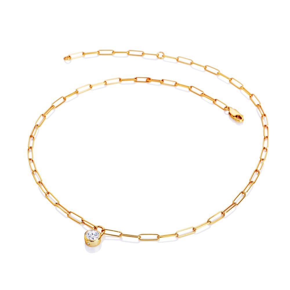Gold chain necklace with a small round pendant
