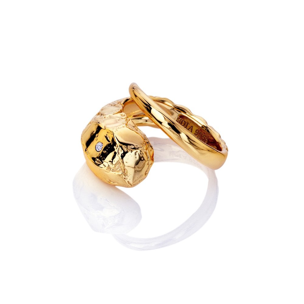 Gold ring with a white band 