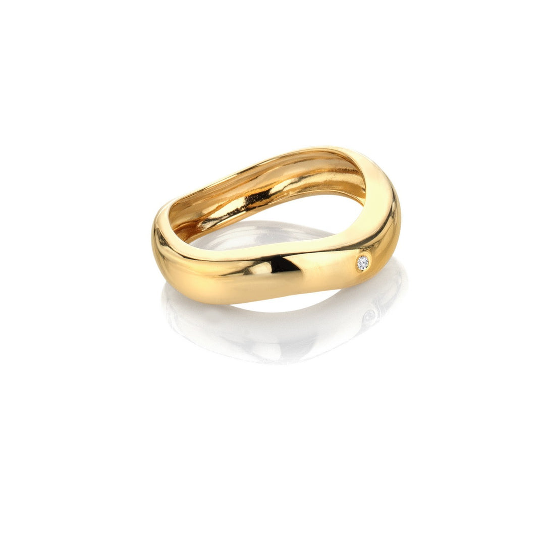 Gold ring with a diamond on a white background