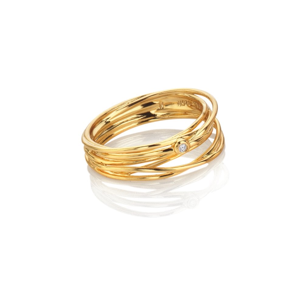 Gold ring with a diamond on a white background