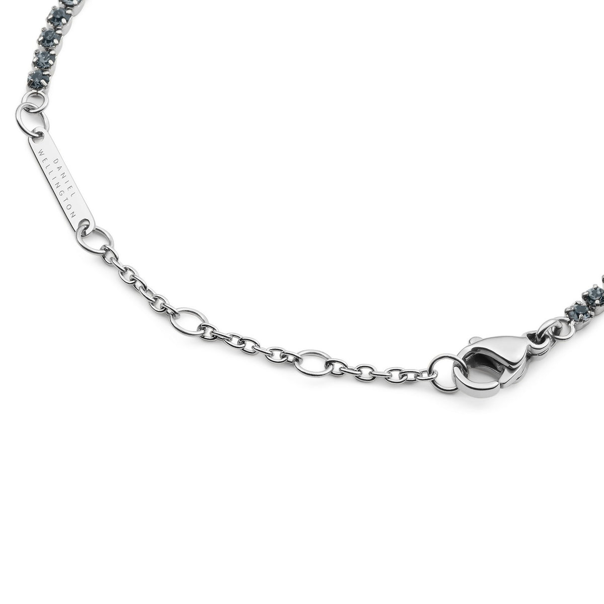 Silver bracelet with a clasp on a white background